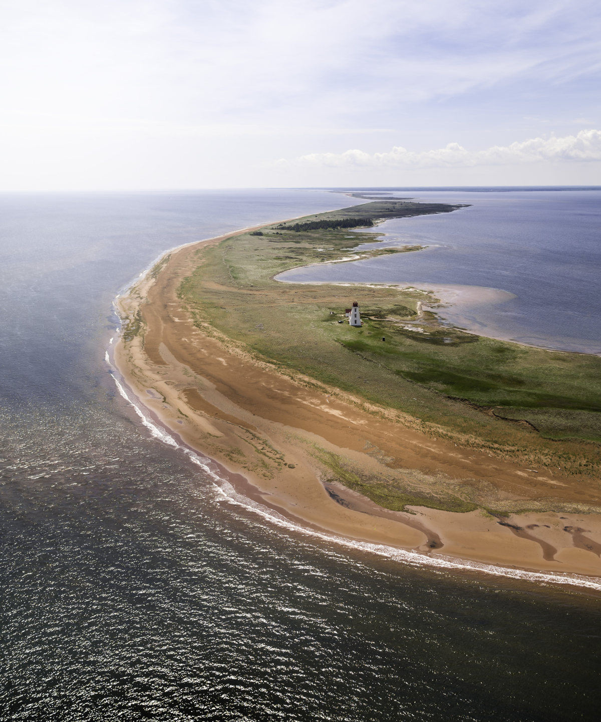 its located on a sand island on the north shore of prince